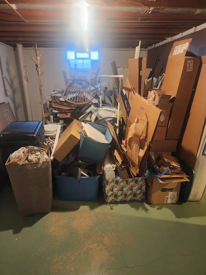 Roll-off dumpster container at job site for 2 Yard Dumpster Rental in Mayo